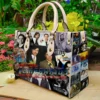 Los Temerarios Leather Handbag